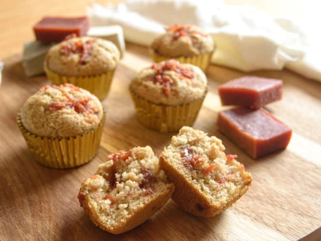 Muffins, candy and muffin in half to show to guava candy inside