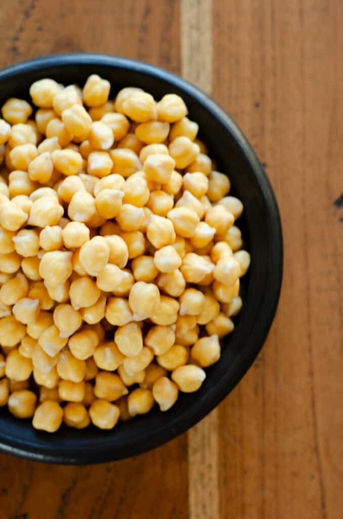 top shot of a bowl on uncooked chickpeas