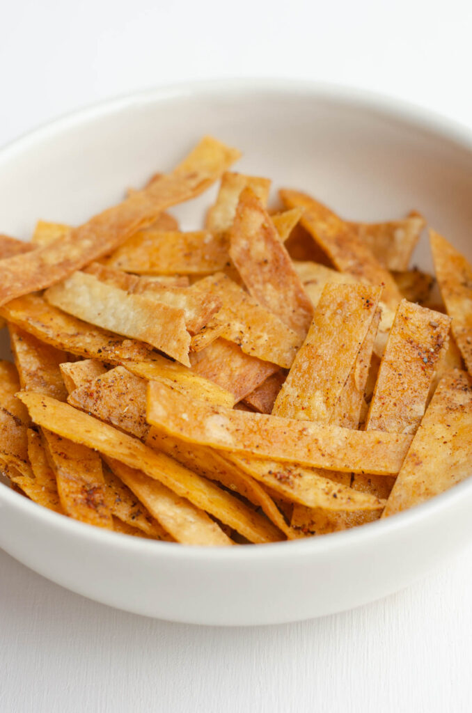 white bowl with homemade fried tortilla  strips