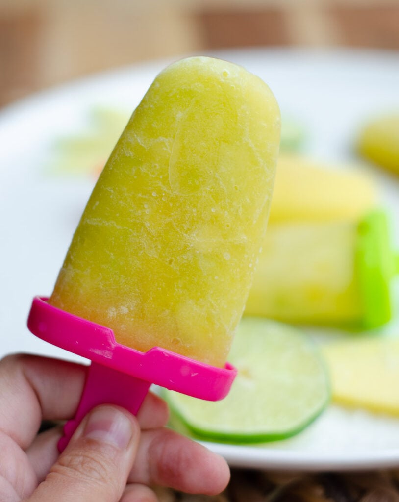 one green mango popsicle up close