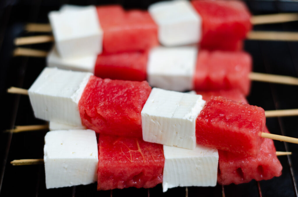 skewers with white cheese and watermelon ready to grill